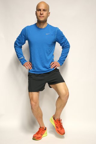 Wide stance single leg squat starting position