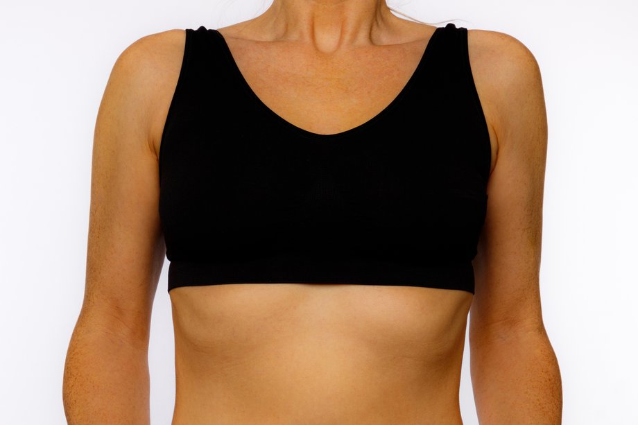 A woman wearing a correctly fitted sports bra