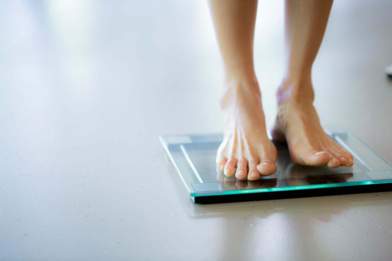 standing on weighing scales